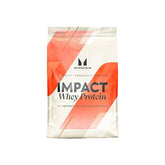A sealed pouch of MyProtein Impact Whey Protein with the brand's logo and the product name prominently displayed. The packaging is predominantly white and orange with a geometric design.